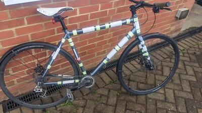 carrera gryphon hybrid bike