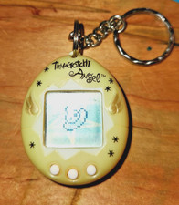 Vtg 1997 Tamagotchi Angel Electronic Game Virtual Pet Pearl/Gold Tested/Works