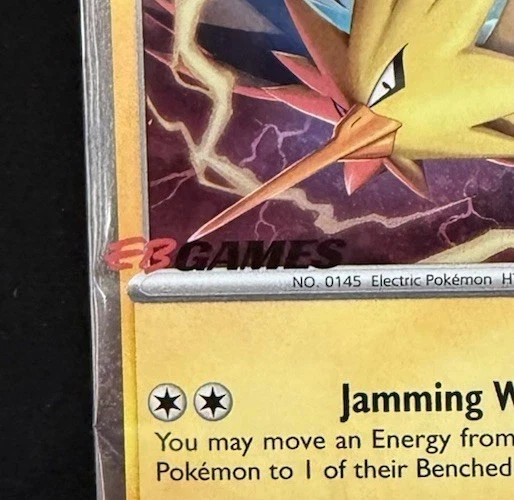 Team Rocket's Zapdos EB GAMES Exclusive SEALED 070/182 Holo Promo Pokemon Card - Image 3 of 3
