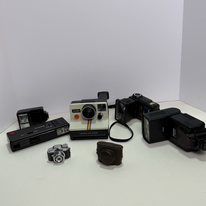 Polaroid OneStep, Speedex, Rokinon 2600, Sigma EF-500 DG ST, Speeder 
