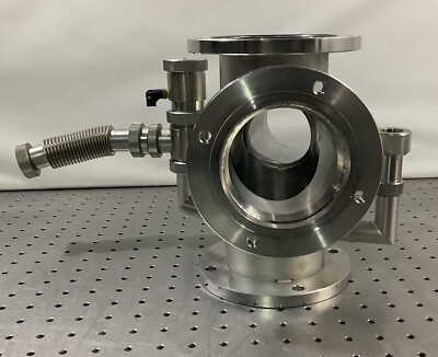 Four way cross with flanges