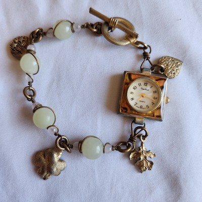 Vintage Pierre Nicol Women's Gold Tone Quartz Watch Charms Moon Stars Heart Leaf