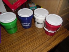 MINI BUCKETS, MENARDS, LOWES, TRACTOR SUPPLY RED AND TRACTOR SUPPLY WHITE W/LIDS