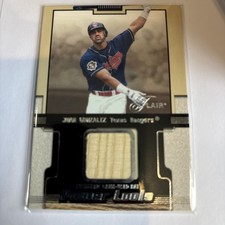 2002 Fleer Flair Juan Gonzalez Power Tools - Game Used Bat Baseball Card
