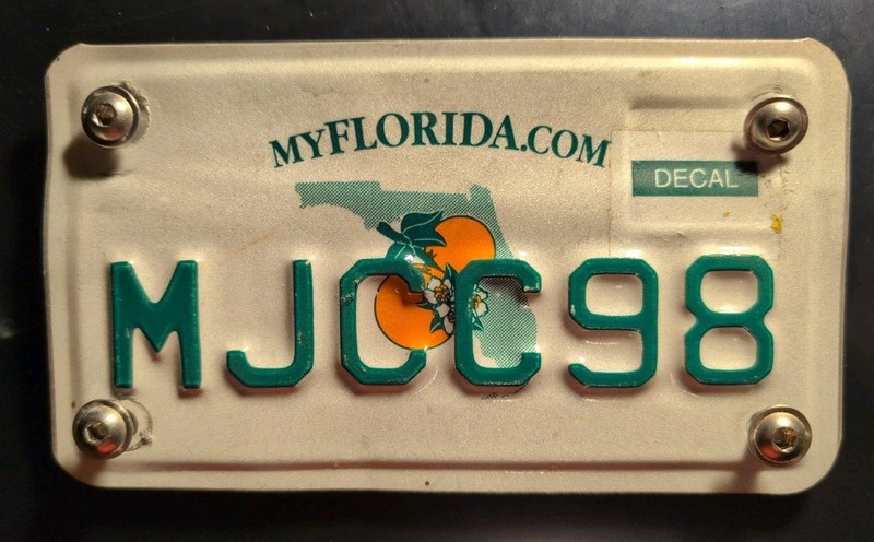 Pre-owned Florida Motorcycle License Plate With Screws #MJCC98 