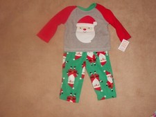 NEW, BABY JUST ONE YOU BY CARTERS 2 PIECE SANTA PAJAMA SET, SIZE 12 MONTHS