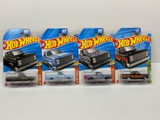 Hot wheels 83 Chevy Silverado pick ups lot of 4 please check pictures