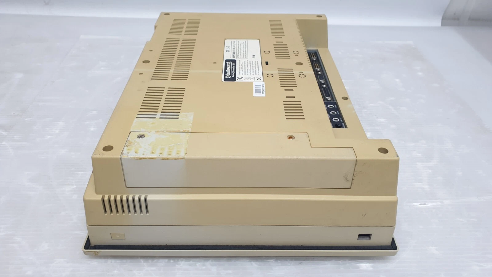 Side view of the CyberResearch STC 12-T housing showing rear I/O edge