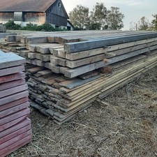 Holzbalken und Bretter abzugeben