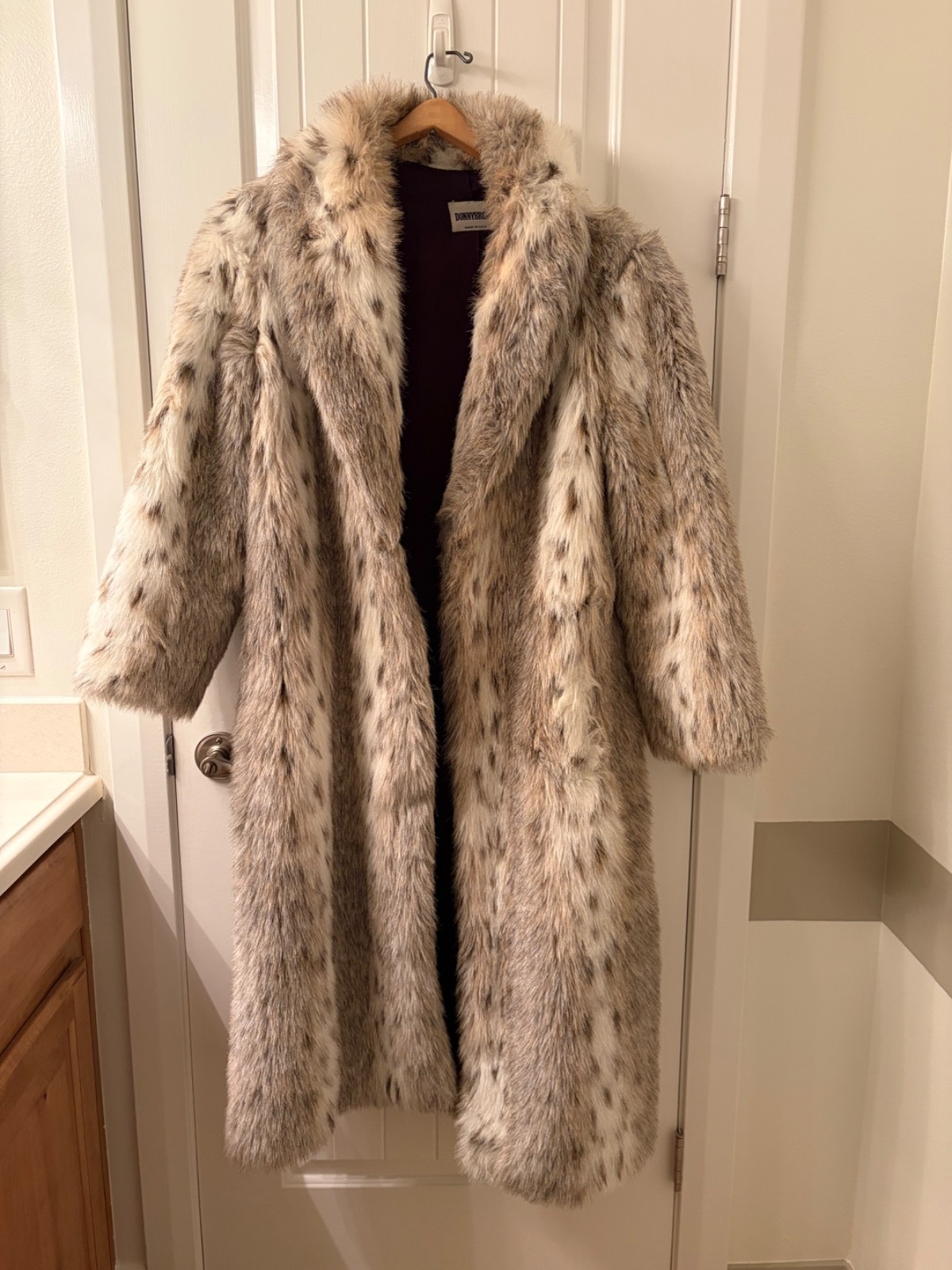 Donnybrook fur coat, long, luxurious, warm, with satin and leather lining.