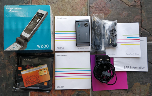 Sony Ericsson Walkman W380i - Magnetic Grey (Orange) Mobile Phone M2 512MB Card