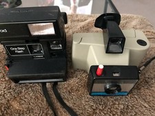 old polaroid cameras x 2 , vintage cameras, great display items