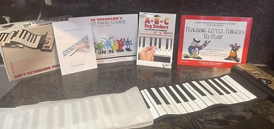 61 Key Roll up Digital Soft Flexible Piano Electronic MIDI Keyboard, & 2 Books