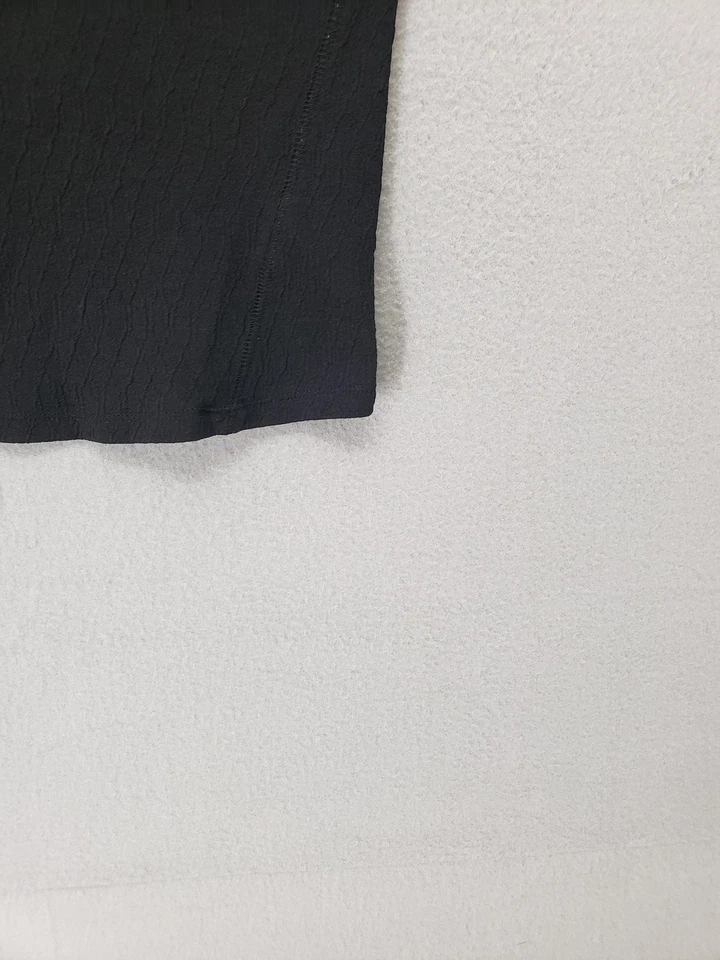 Camiseta sin mangas de algodón para mujer mediana negra sin mangas acanalada elástica Foto 4 de 4