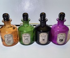 Set Of Four 2026 Round/ 7  Tall Halloween Potion Bottles