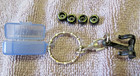 vintage mini skate board wheels storeage case keychain — photo 1