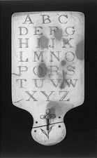 Photo:Photo of Slate alphabet board with handle. 17th Century?