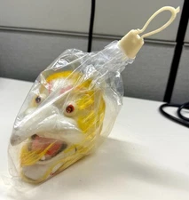 Vintage 1960s SHRUNKEN HEAD Witch Hot Rod Hanger Sealed Halloween Yellow Hair