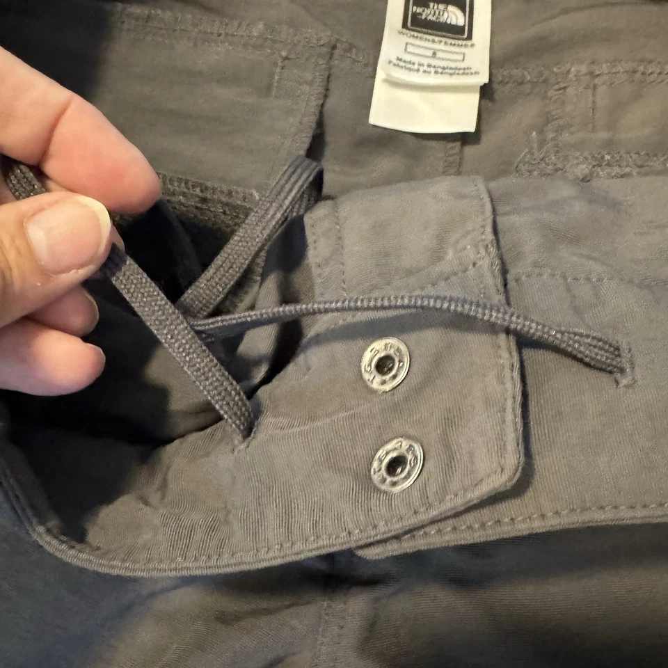 Pantalones THE NORTH FACE para mujer talla 8 gris oscuro ligeros bolsillos con cremallera senderismo usados en excelente estado Foto 4 de 4
