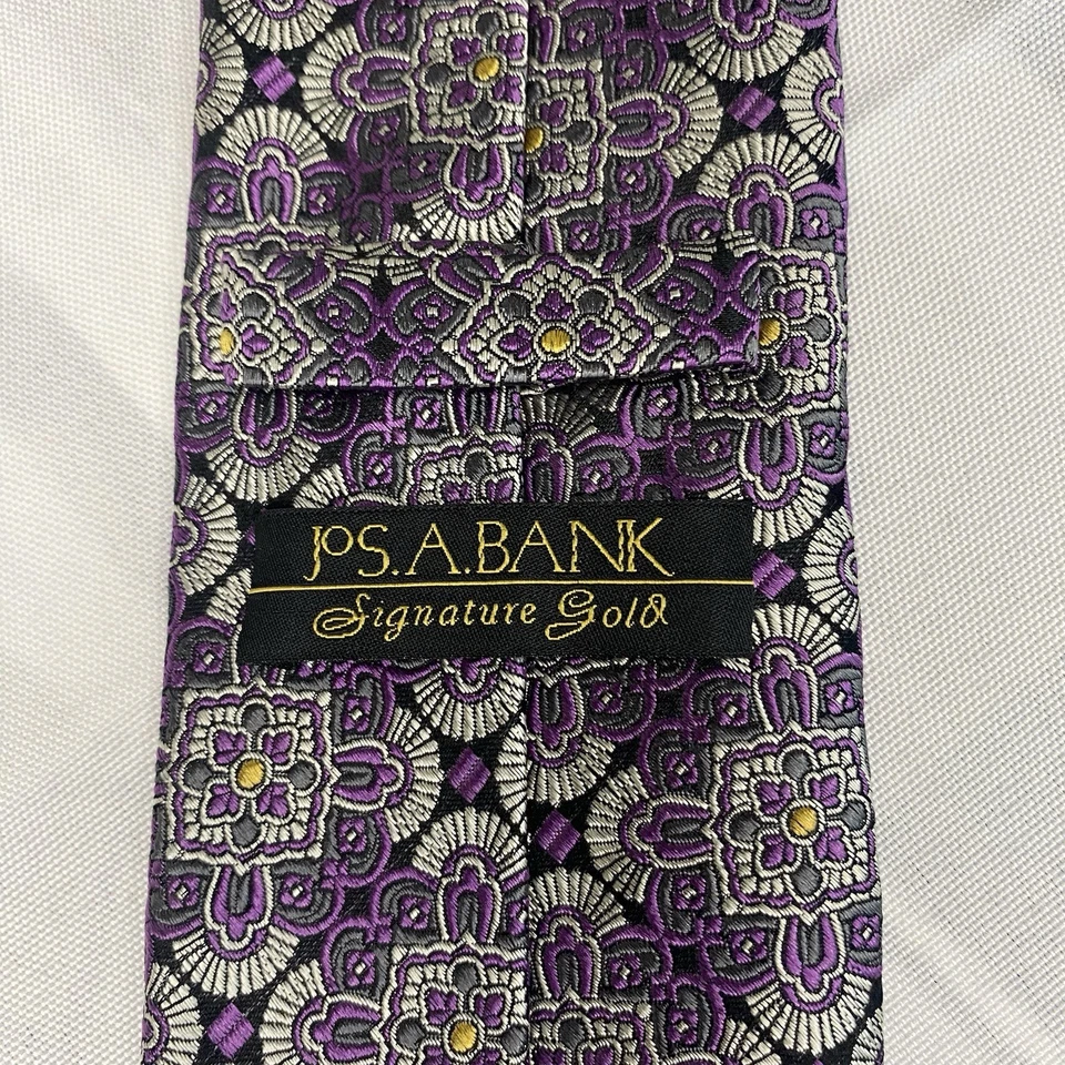 Corbata dorada Jos A Bank Signature adulto 62x3,50 púrpura estampado geométrico 100 % seda Foto 2 de 2