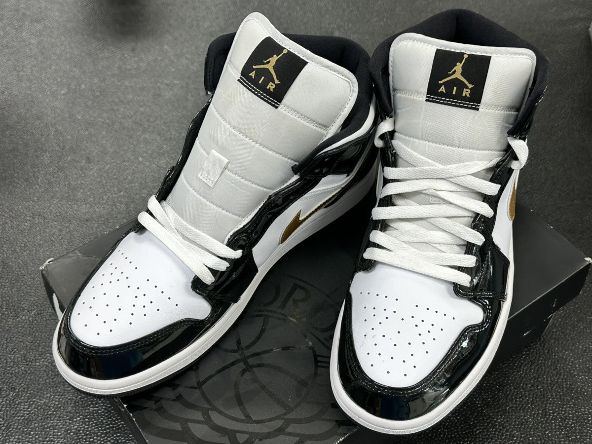 black and white shiny jordans