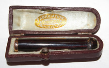 ancien fume cigarette  bakélite et vermeil