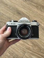 Pentax K1000 35mm SLR Film Camera Pentax A 50mm f2 Lens Tested Working N Mint