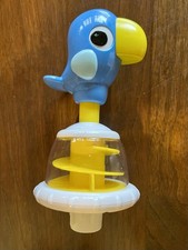 A replacement toucan toy part for the Bright Starts Around We Go Activity Center