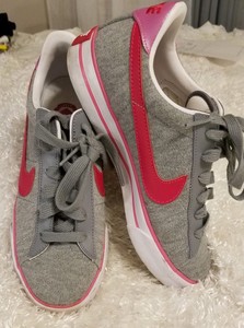 nike pink swoosh shoes
