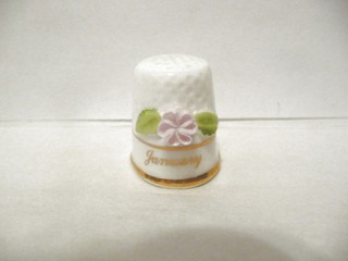 THIMBLE VINTAGE BONE CHINA MARURI MASTERPEICE "JANUARY" W/PINK CARNATION AFFIXED