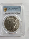 1924 S Peace Silver Dollar graded by PCGS Genuine AU with detail altered surface