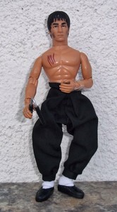 bruce lee enter the dragon nunchucks