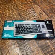 New/Sealed. Logitech Cordless MediaBoard Y-RA...