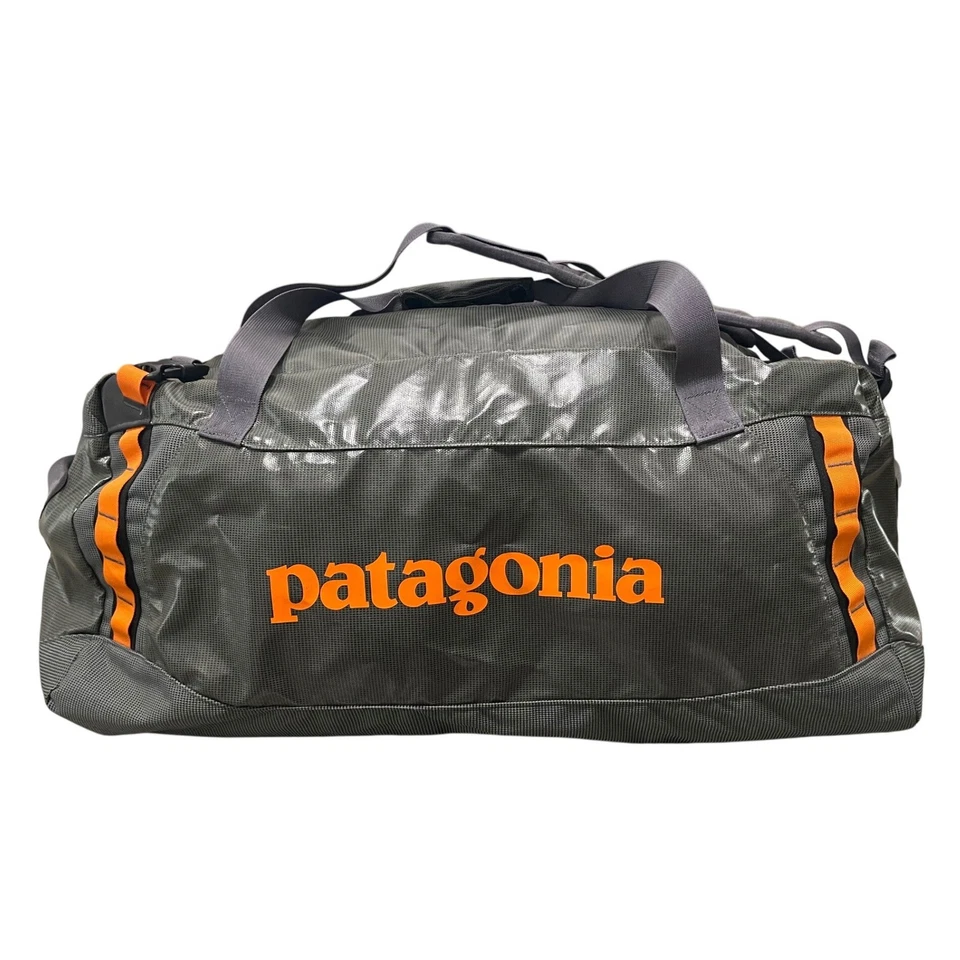 Bolsa de Lona Patagonia Agujero Negro 45L Equipo de Viaje Lona Equipaje Naranja Correas Traseras Foto 2 de 4