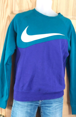 purple and turquoise nike shirt