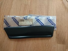 Nissan Sunny B11,RH front wing front moulding, new genuine part. 