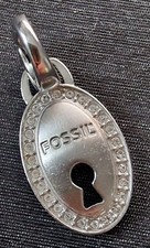 Fossil Lock Charm - Silver colour with stones surrounding lock