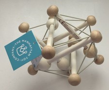 manhattan toy skwish natural rattle and teether grasping activity toy