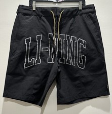 Li-Ning men's Black Sz XL Long Shorts Logo Spell out Pockets