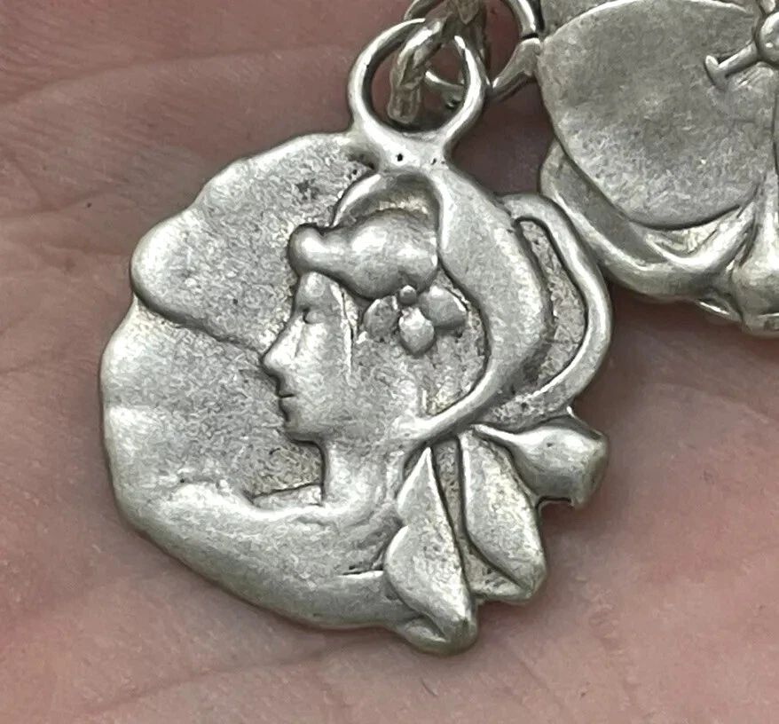 Antiguo dije colgante vintage de plata esterlina Art Noveau dama y flor de pensamiento