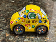 M & M'S CANDY TIN YELLOW VOLKSWAGEN COLLECTIBLE CONTAINER