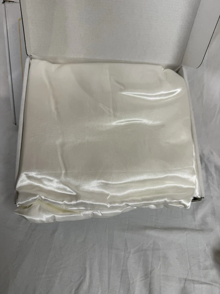 PACK DE DOS JUEGOS. Sábana bajera 600TC blanca. Foto 3 de 4