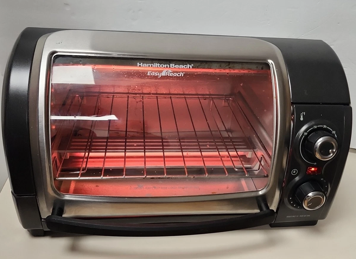 Hamilton Beach Easy Reach Toaster Oven with Roll-Top Door works great!  Space