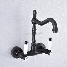 Oil Rubbed Bronze Swivel Spout Bathroom Basin Sink Faucet Mixer Tap Wall Mount