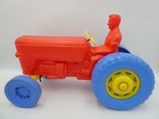 LARGE VINTAGE MID CENTURY TOY PLASTIC FARMER DRIVING TRACTOR