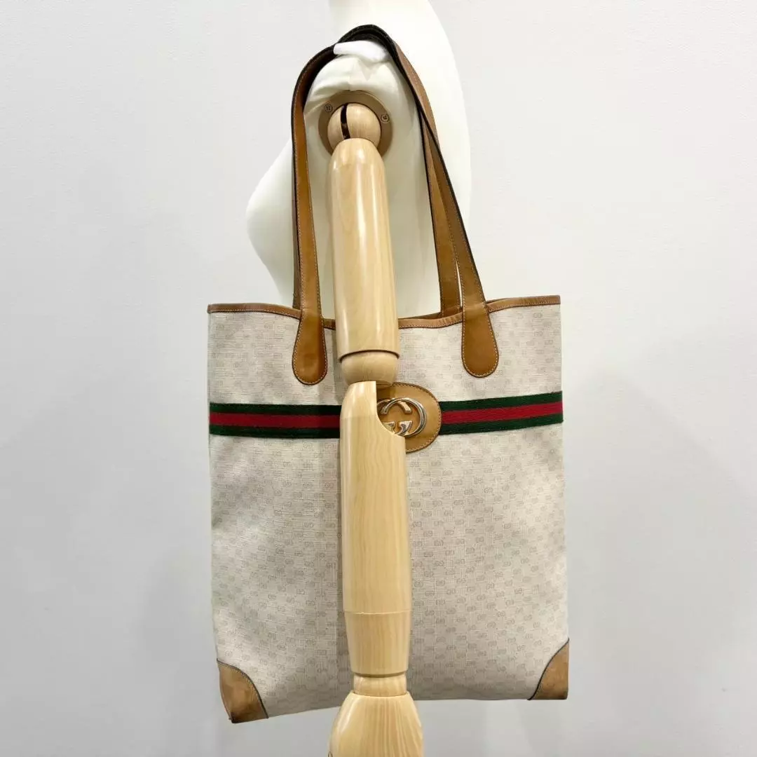 Sac fourre tout Gucci ligne Sherry imbriquée Micro GG beige