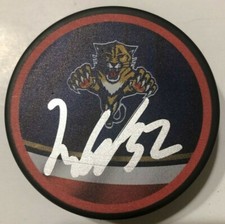LUCAS CARLSSON SIGNED FLORIDA PANTHERS HOCKEY PUCK W/ CASE COA