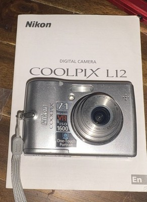 Nikon Coolpix L12 7.1MP Digital Camera Silver w/ Box Manual
