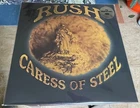 New LP-RUSH Caress Of Steel 180 GRAM "Necromancer"/"Lakeside Park"/"Bastille Day