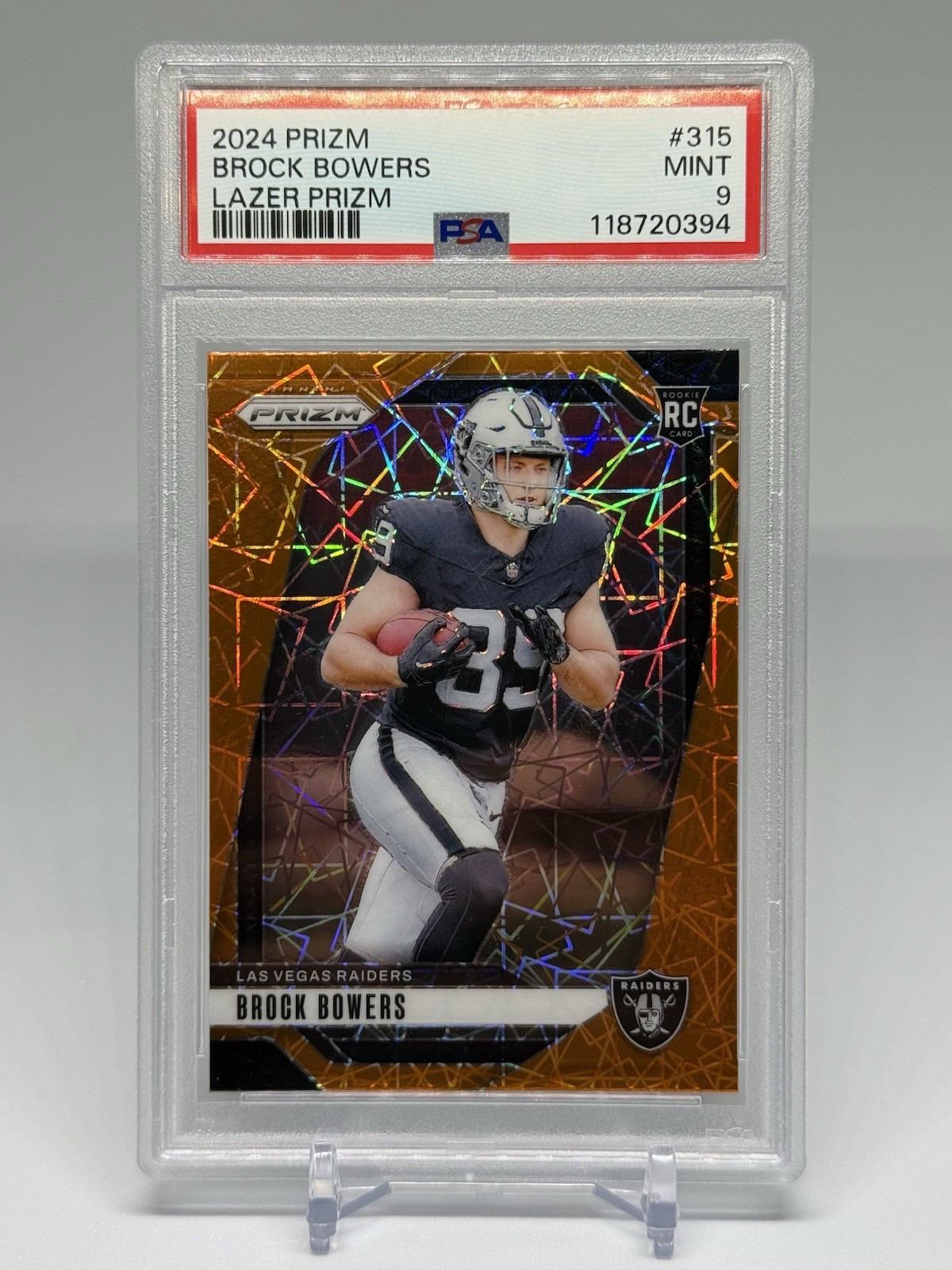 2024 Panini PRIZM Brock Bowers Orange Lazer Prizm RC #315 Raiders PSA 9
